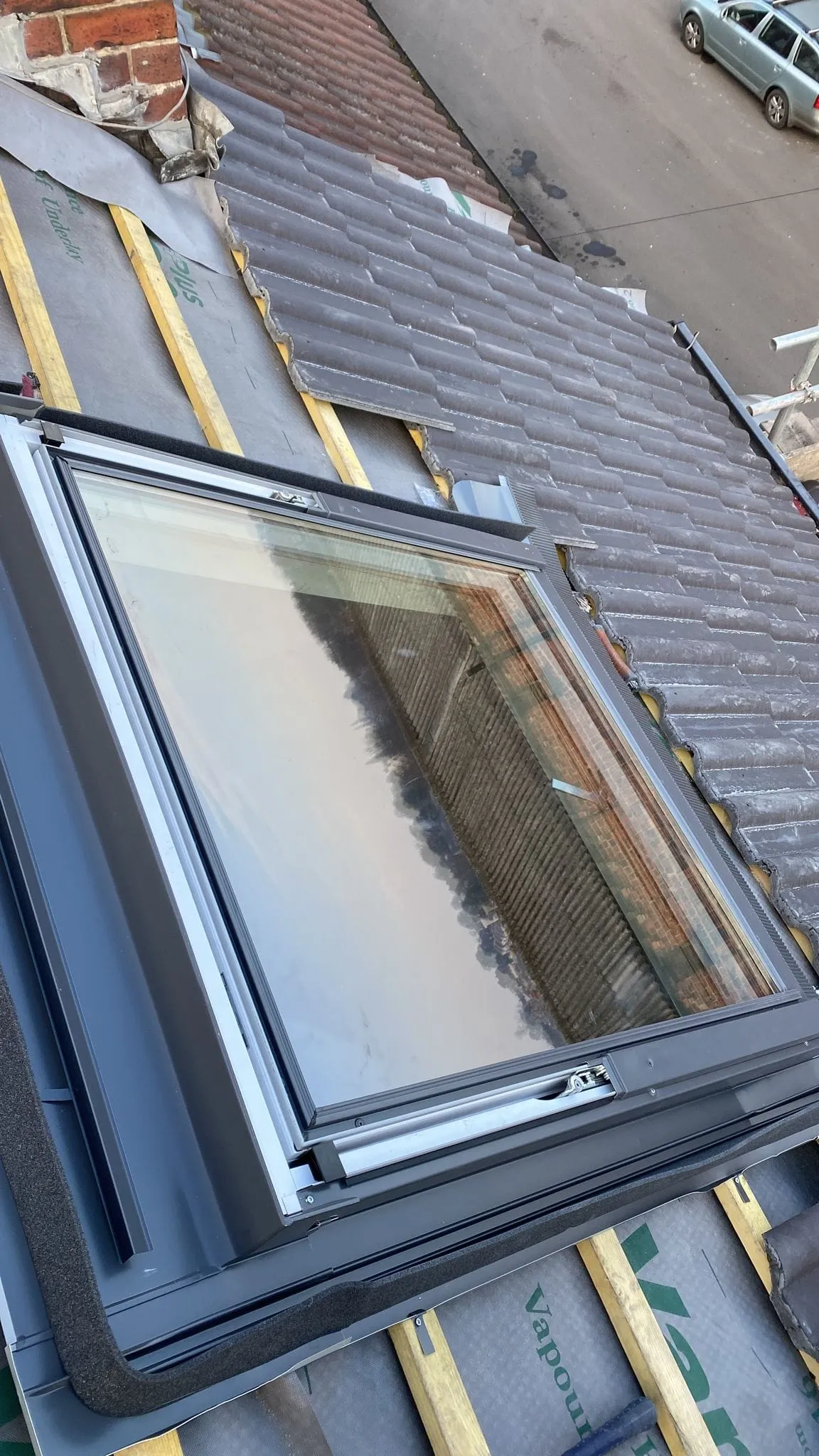 a flat roof with a window on top of it
